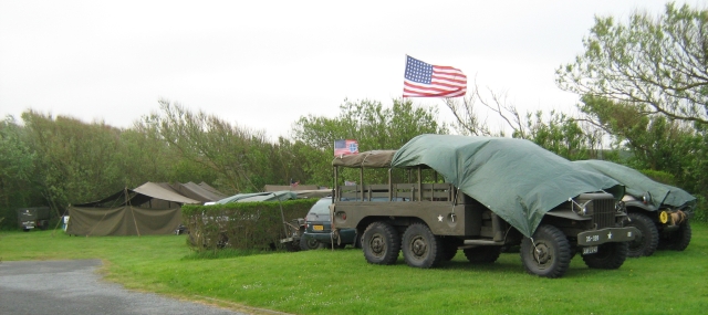 world war two military trucks with military tents at the campsite in wimeraux